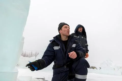 Portrait of an assembler in a blue jacket 스톡 사진
