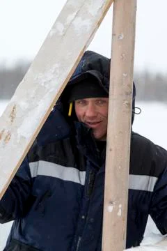 Portrait of an assembler in a blue jacket Foto stock