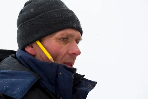 Portrait of an assembler in a blue jacket 스톡 사진