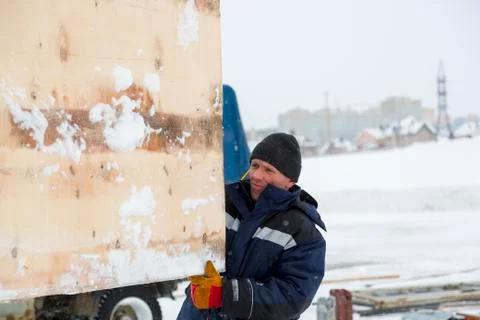 Portrait of an assembler in a blue jacket Fotos Stock