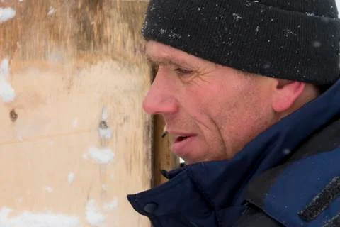 Portrait of an assembler in a blue jacket Fotos Stock