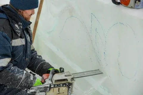 Portrait of an assembler with a chainsaw in his hands Fotos Stock