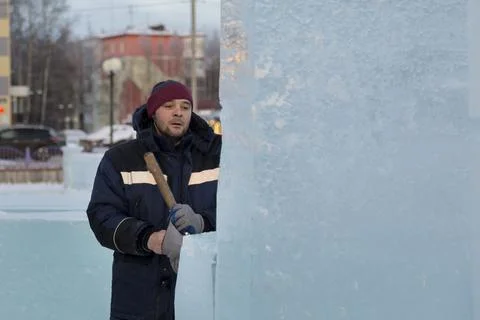 Portrait of an assembler with a chisel in his hand 写真素材