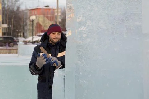 Portrait of an assembler with a chisel in his hand 스톡 사진