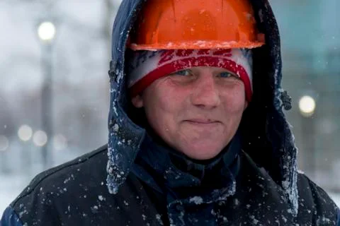 Portrait of an assembler in an orange helmet Stock-Fotos