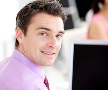 Portrait of an assertive businessman looking at the camera Stock Photos