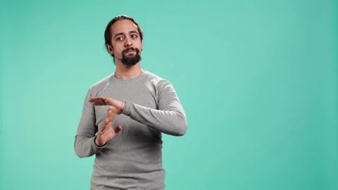 Portrait of assertive man asking for timeout, doing hand gestures Stock Footage 318158508