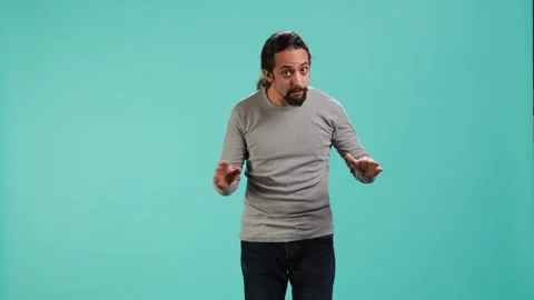Portrait of assertive man asking for timeout, doing hand gestures 스톡 동영상 318165219