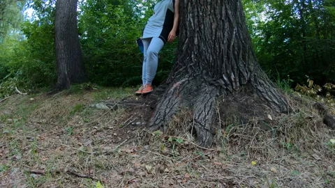 Portrait of an athlete resting in the woods Video stock 101511654