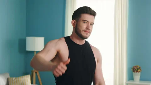 Portrait of Athletic Man Showing "Like" Stock Footage 141661757