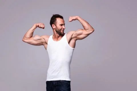 Portrait of athletic man in white undershirt Stock Photos