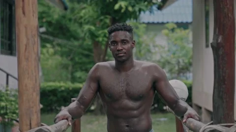 Portrait of athletic perspiring guy resting after powerful workout training Stockbeeldmateriaal 141603820