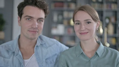 Portrait of Attractive Couple Looking at the Camera and Smiling Stock Footage 118668767