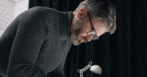 Portrait of Attractive Engineer making Drawings and Blueprints at his Office Stock Footage 126253052