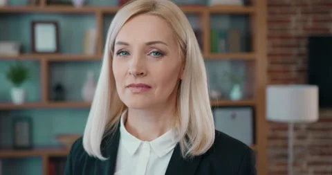 Portrait of attractive thoughtful experienced blond businesswoman which looking Stock Footage 203528069