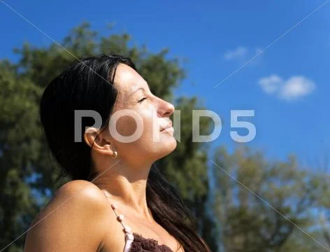 Portrait attractive young girl relaxes Stock Photos