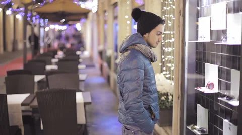 Portrait of an attractive young man looking at the shop window Stock Footage 35154485