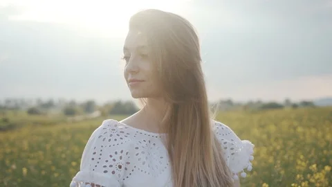 Portrait attractive young woman stand look at camera smile flower feel freedom Stock Footage 112744053