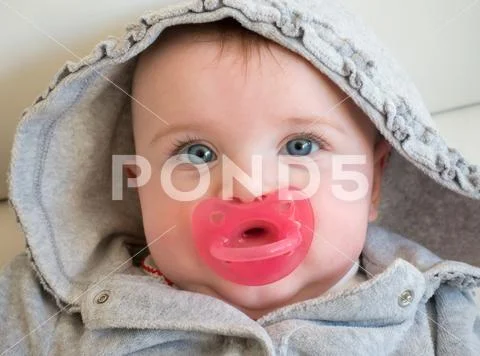 Portrait of baby girl with blue eyes Stock Photos