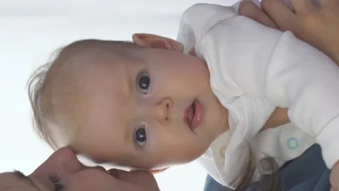 Portrait of baby looking at camera Stock Footage 227573684