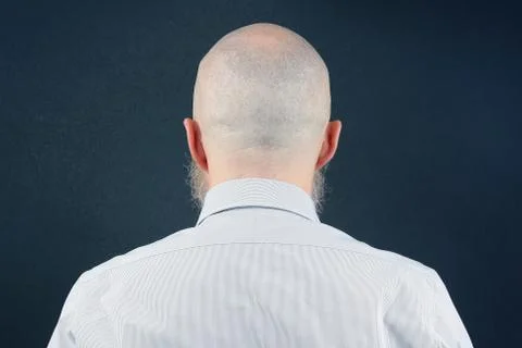 Portrait of bald man with beard from back Stock Photos