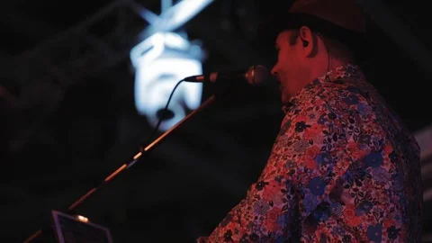 Portrait of a balkan singer  on stage Stock Footage 105360802