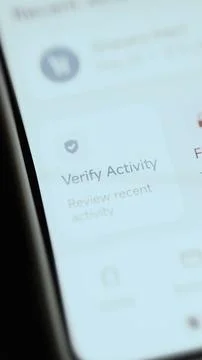 Portrait banking interface emphasizes verify activity and review recent Stock Photos