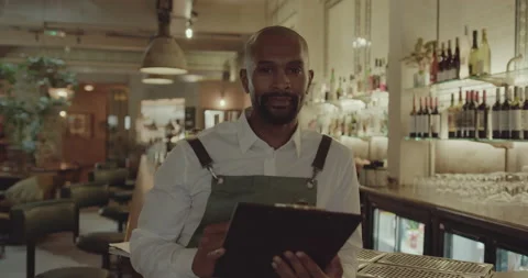 Portrait of Bar Employee Looking at Camera Stock Footage 221990045