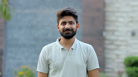 Portrait of a bearded Indian man doing yes gesture while looking at the camera Stock Footage 157849574