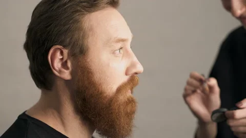 Portrait of bearded man during the makeup. Stock Footage 122599564