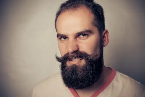 Portrait of a Bearded Man evil Stock Photos