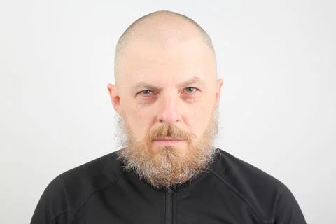 Portrait of a bearded man on a light background Stock Photos