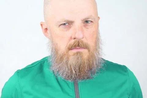 Portrait of a bearded man on a light background Stock Photos