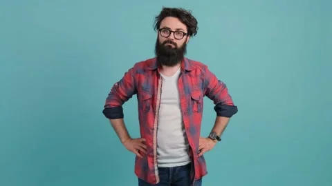 Portrait of a bearded man making the time out gesture, asking for a break. Stock Footage 140500892