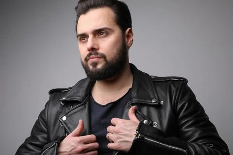Portrait of bearded young man posing on white wall. Mind set and self help idea Stock-Fotos