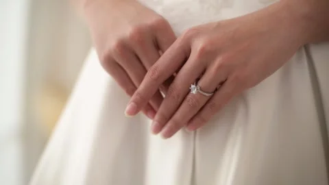Portrait of beautiful bride with makeup and hairstyle in elegant wedding dr.. Video stock 280206207