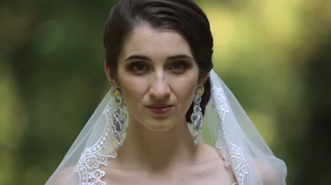 Portrait of a beautiful bride on the nature Stock Footage 40696785
