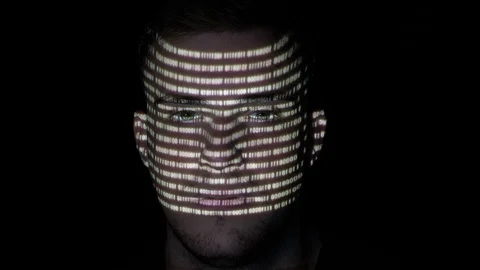 Portrait of a beautiful computer programmer hacking white binary code charact Stock Footage 86434942