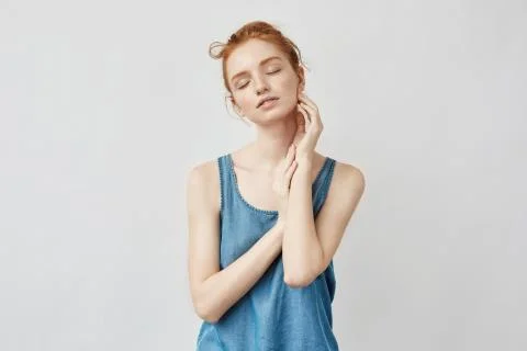 Portrait of beautiful foxy model posing with closed eyes Stock Photos