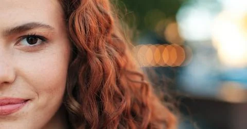 Portrait of beautiful girl of caucasian ethnicity with curly ginger hair Stock Photos