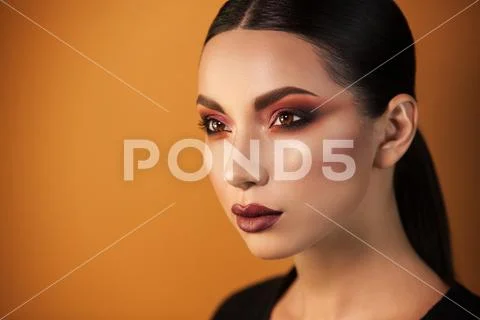 Portrait of beautiful girl professional make-up artist Stock Photos
