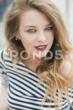 Portrait of a beautiful girl in the vest Stock Photos