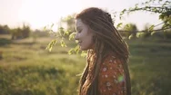 Portrait Of An Beautiful Hippie Woman With Dreadlocks In The Woods At Sunset Stock Footage