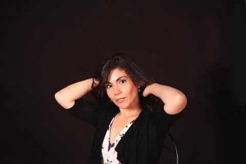 Portrait of a beautiful lady posing for  the camera on isolated background Stock Photos