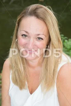 Portrait of beautiful middle aged blond woman Stock Photos