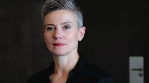 Portrait of Beautiful Middle Aged White Woman with Short Grey Hair 库存影片 121105244