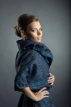 Portrait of beautiful model posing in stylish coat Stock Photos