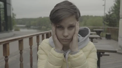 Portrait of a beautiful sad girl Stock Footage 89652753