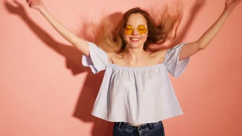 Portrait of beautiful smiling cute model in round sunglasses Stock Footage 140837451