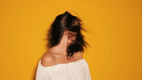 Portrait of beautiful smiling cute model shaking her head Stock Footage 141861614